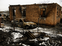 Houses and civilian cars are being destroyed in the fire following an attack by Russia's Shahed strike drones in Kharkiv, Ukraine, on Februa...