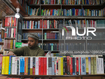 A Kashmiri bookseller is adjusting books at his 'bestseller' bookshop in Srinagar, Kashmir, India, on February 12, 2024. For the first time,...