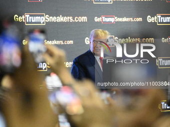 Former U.S. President Donald Trump is speaking on stage during an appearance at SneakerCon at the Pennsylvania Convention Center in Philadel...