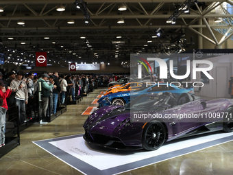People are visiting the 2024 Canadian International Auto Show in Toronto, Canada, on February 19, 2024. (
