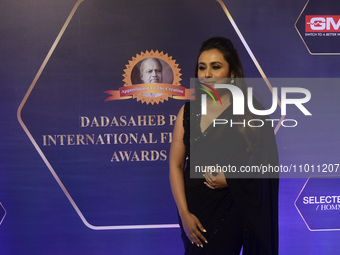 Bollywood actress Rani Mukherji is posing for a photoshoot on the red carpet at the 'Dadasaheb Phalke International Film Festival Awards 202...