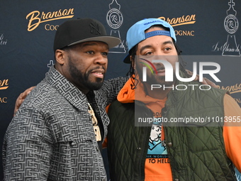 Curtis ''50 Cent'' Jackson (left) is attending a bottle signing event featuring his Branson Cognac and Chemin du Roi champagne at Stew Leona...