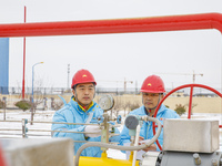 Workers are conducting a safety inspection of gas facilities and equipment at the Gas Gate station in Donghai County, Lianyungang city, East...