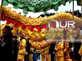 Tourists are visiting rural dragon dance performances in Jinpin Country, Qiandongnan, Guizhou, China, on February 22, 2024. (