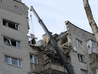 A block of flats in Dnipro, Ukraine, is showing damage after being hit by a Russian Shahed drone in an overnight attack on February 23, 2024...