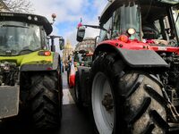 French farmers are driving tractors during a demonstration by the Coordination Rurale agricultural union, ahead of the opening of the 60th I...