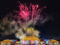 A large-scale fireworks show is being held at the Tanguo Ancient City scenic spot in Linyi, Shandong Province, China, on the evening of Febr...