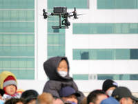 A DJI police drone is patrolling over the city in Yantai, East China's Shandong province, on February 23, 2024. (