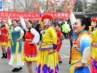 Folk artists are performing a folk show on Xianfu Street in the Fushan district of Yantai, China, on February 24, 2024. (