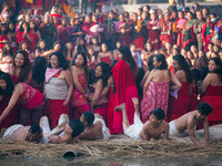 Nepalese Hindu devotees are participating in a rolling procession around the Hanumante River during the month-long Madhav Narayan Festival,...