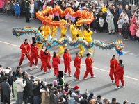 Folk artists are performing a dragon dance in Korla, Northwest China's Xinjiang Uygur Autonomous Region, on February 24, 2024. (