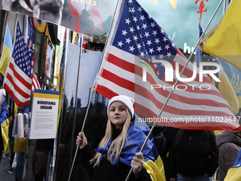 People observe the second anniversary of the war in Ukraine in Times Square on February, 24,2024 in New York City, USA.   (