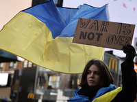 People observe the second anniversary of the war in Ukraine in Times Square on February, 24,2024 in New York City, USA.   (