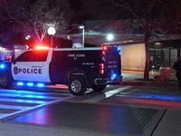 Police vehicles are on the scene on Sunday morning following a shooting at Anacostia Metro Station on Saturday evening. There is a heavy pol...