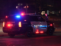 Police vehicles are on the scene on Sunday morning following a shooting at Anacostia Metro Station on Saturday evening. There is a heavy pol...