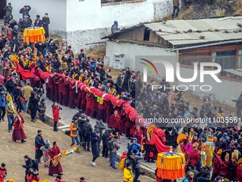 Tibetans are taking part in a Buddhist festival at Langmu Temple in Gannan Tibetan Autonomous Prefecture, in Gansu Province, Northwest China...