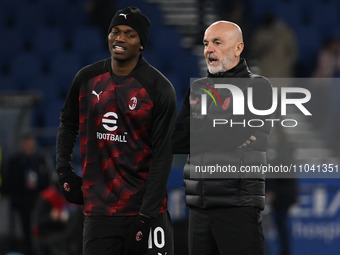 Rafael Leao and Stefano Pioli of A.C. Milan are participating in the 27th day of the Serie A Championship during the match between S.S. Lazi...