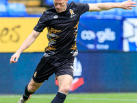 Michael Morrison #5 of Cambridge United is warming up before the match during the Sky Bet League 1 match between Bolton Wanderers and Cambri...