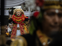 Tari Topeng, or Mask Dance, is being performed before a cleansing ceremony called 'Melasti' at Segara Temple in Jakarta, Indonesia, on March...