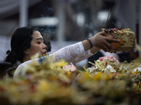Indonesian Hindus are carrying offerings for prayers during a cleansing ceremony called 'Melasti' at Segara Temple in Jakarta, Indonesia, on...