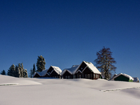 Tourist huts are seen after a day of snowstorm at the Gulmarg Ski Resort in Baramulla district, Indian Administered Kashmir, on March 3, 202...