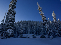 Tourist huts are seen after a day of snowstorm at the Gulmarg Ski Resort in Baramulla district, Indian Administered Kashmir, on March 3, 202...