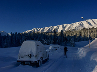 A snow-covered meadow is seen following a day of snowstorms at the Gulmarg Ski Resort in the Baramulla district, Indian Administered Kashmir...