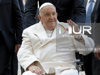 Pope Francis is leaving at the end of his weekly general audience in St. Peter's Square at the Vatican, on March 6, 2024. (
