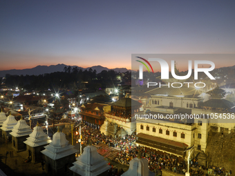 The Pashupatinath Temple is being captured in a long exposure shot on the eve of Maha Shivaratri in Kathmandu, Nepal, on March 7, 2024. (