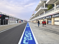 The pit lane is bustling with activity on Day One of the Qatar MotoGP at the Lusail International Circuit in Lusail, Qatar, on March 7, 2024...