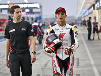 Honda Team Asia Moto3 riders are posing for a photo ahead of the Qatar Airways Motorcycle Grand Prix of Qatar at Losail International Circui...