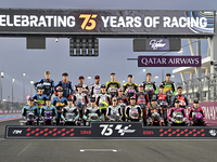 Moto3 riders are posing for a photo ahead of the Qatar Airways Motorcycle Grand Prix of Qatar at the Losail International Circuit in Losail,...