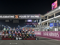 Moto2 riders are posing for a photo ahead of the Qatar Airways Motorcycle Grand Prix of Qatar at the Losail International Circuit in Losail,...