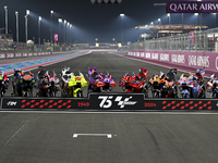 The MotoGP bikes are parked on the track during a photo session ahead of the Qatar Airways Motorcycle Grand Prix of Qatar at Losail Internat...