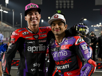 Spanish MotoGP riders Aleix Espargaro (L) of Aprilia Racing and Jorge Martin (R) of Prima Pramac Racing are posing for a photo ahead of the...