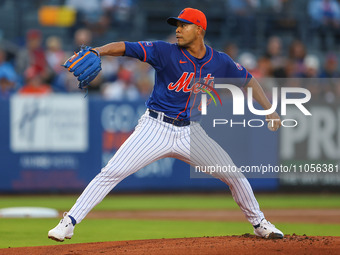 New York Mets starting pitcher Jose Quintana #62 is throwing during the first inning of a baseball game against the Washington Nationals at...