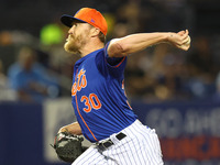 New York Mets relief pitcher Jake Diekman #30 is throwing during the fifth inning of a baseball game against the Washington Nationals at Clo...