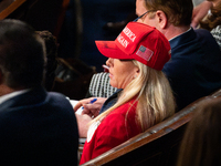 Rep. Marjorie Taylor Greene (R-GA) wears a Trump MAGA hat at President Joe Biden's annual State of the Union address to a joint session of C...