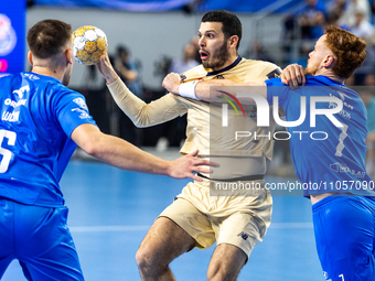 Rui Silva and Tomas Piroch are playing in the EHF Champions League Men 2023/2024 match between Orlen Wisla Plock and FC Porto in Plock, Pola...