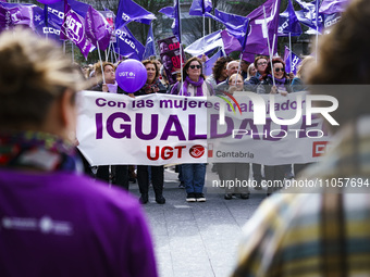 Women are holding a banner that says ''equality'' during a demonstration for International Women's Day in Santander, Spain. (