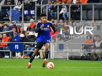Ian Murphy, a defender for FC Cincinnati, is playing in the 2024 Concacaf Champions Cup Round of 16 match against CF Monterrey at TQL Stadiu...