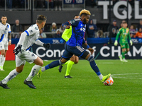 Aaron Boupendza, the Cincinnati forward, is participating in the 2024 Concacaf Champions Cup Round of 16 match between FC Cincinnati and CF...