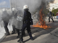 Clashes are occurring with riot police outside the parliament  in a protest in central Athens, Greece, on 8 March 2024 against a bill that w...