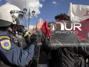 An injured student is at the protest after clashes with riot police  in a protest in central Athens, Greece, on 8 March 2024 against a bill...