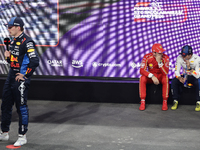 Max Verstappen of Red Bull Racing, Charles Leclerc of Ferrari and Sergio Perez of Red Bull Racing after qualifying ahead of the Formula 1 Sa...