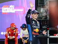 Charles Leclerc of Ferrari, Sergio Perez and Max Verstappen of Red Bull Racing after qualifying ahead of the Formula 1 Saudi Arabian Grand P...