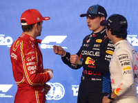 Charles Leclerc of Ferrari, Max Verstappen and Sergio Perez of Red Bull Racing after qualifying ahead of the Formula 1 Saudi Arabian Grand P...