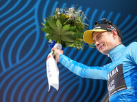 Jonas Vingegaard of Denmark and Team Visma - Lease a Bike is celebrating on the podium with the Blue Leader Jersey of the 59th Tirreno-Adria...
