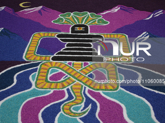 A rangoli design of a Shiva linga is being made from colorful rice at a Hindu temple in Richmond Hill, Ontario, Canada, on March 8, 2024, on...