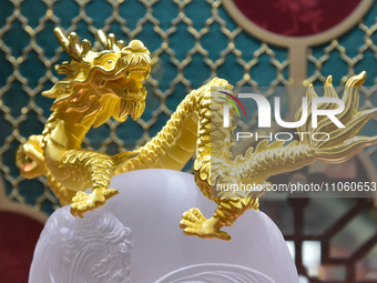 Gold ornaments are on display at a gold shop in Nanjing, Jiangsu province, China, on March 9, 2024. (